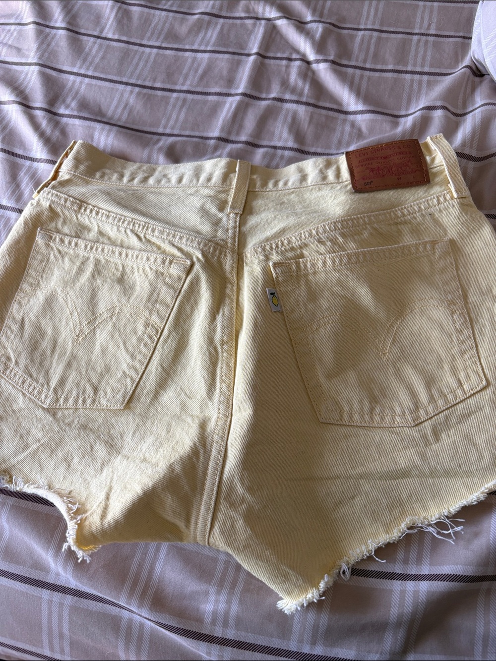 Levi's Butter Yellow High-Rise button fly Denim Cutoff Shorts